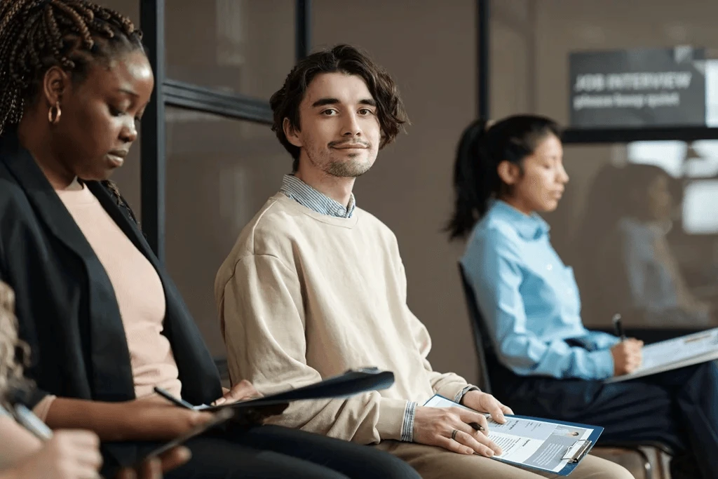 Job Seekers Waiting For Their Turn For An Interview