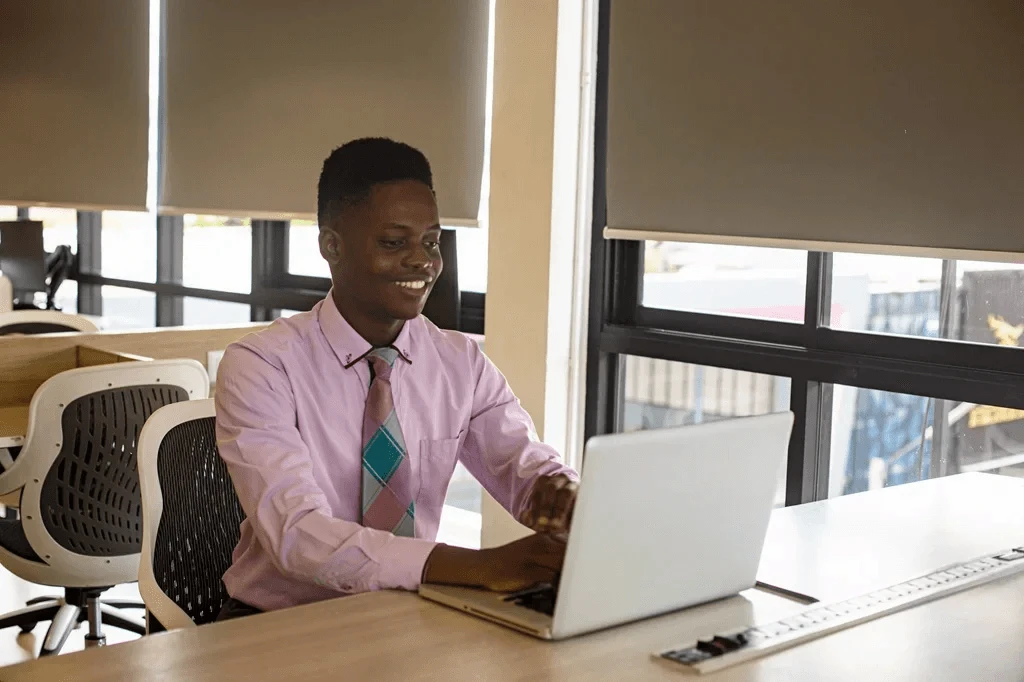 Newly Hired Employee Researching For Effective Career Advice For Young Adults