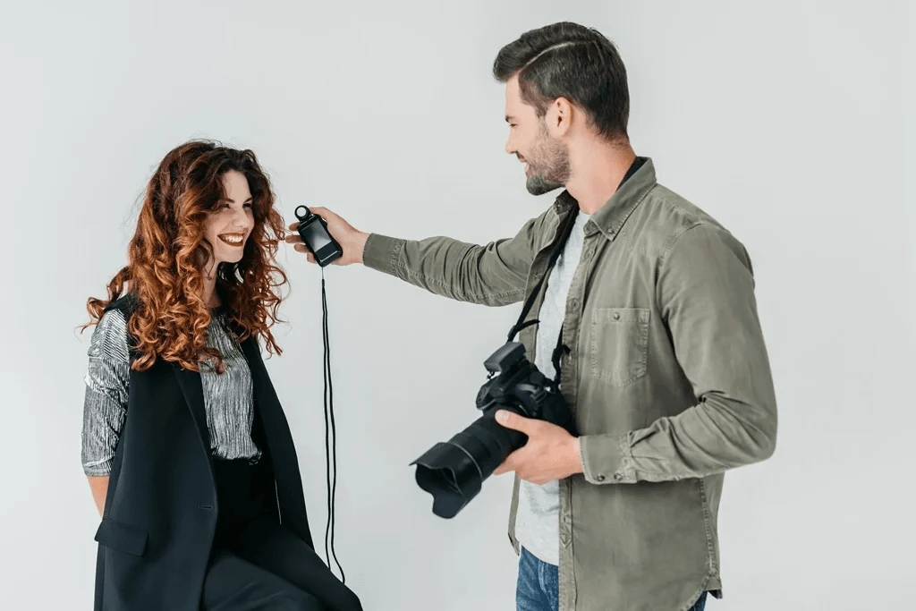 Photographer Fixing The Posture Of The Job Applicant