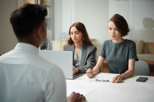 Recruiters Listening To The Answers Of A Job Applicant