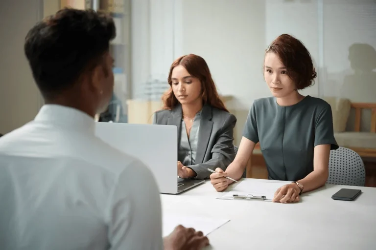 recruiters listening to the answers of a job applicant