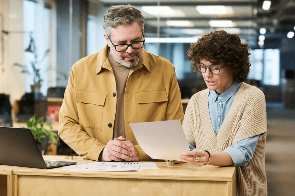 Student Reviewing The Letter Of Recommendation Written By His Professor