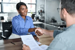 Applicant Shaking The Hands Of The Employer Before The Interview