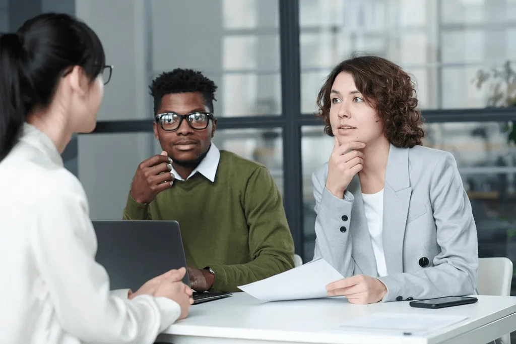 Headhunters Listening To The Answers Of A Job Candidate