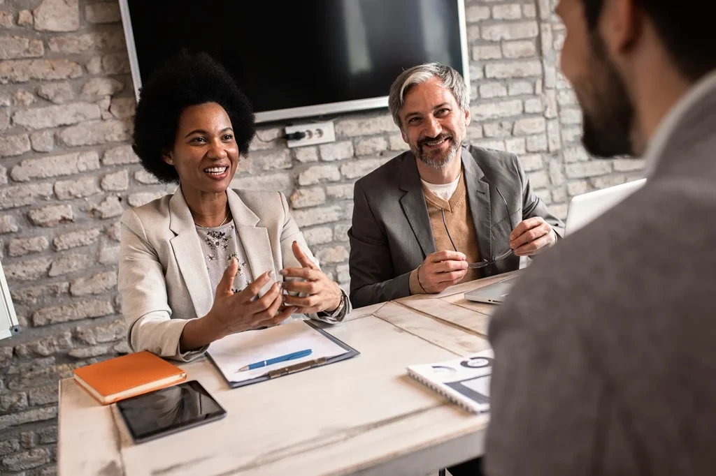 Job Applicant Answering Competency Based Interview Questions From The Hiring Managers