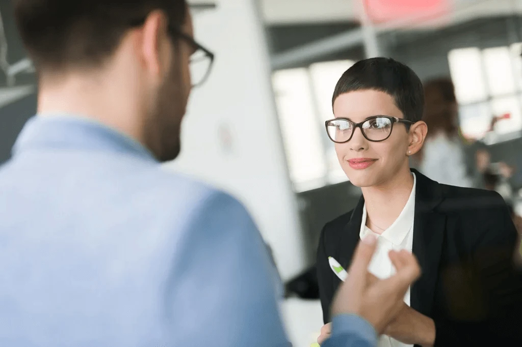 Job Seeker Discussing His Application With A Headhunter