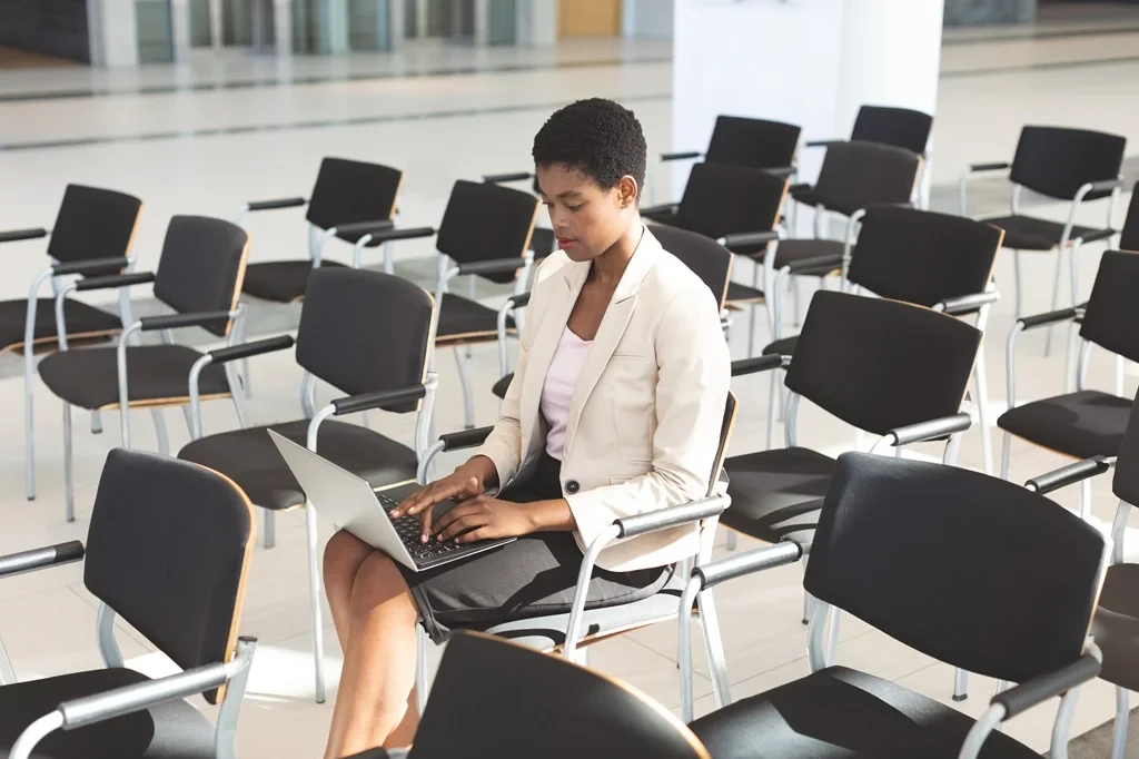 Job Seeker Researching How To Prepare For A Job Fair