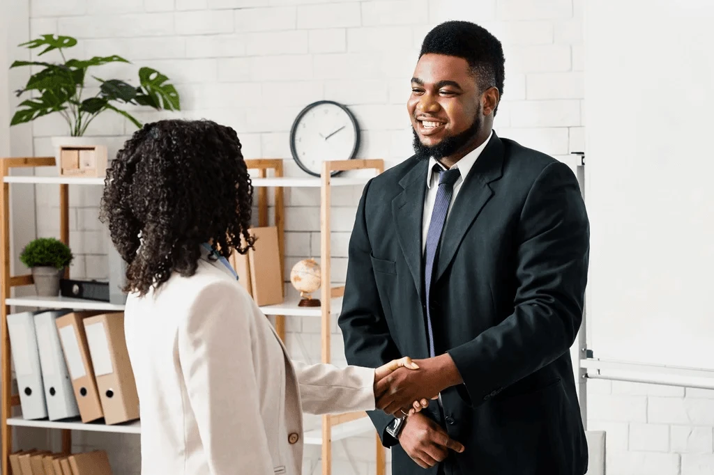 Newly Hired Employee Getting Welcomed In His New Office