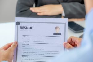 Office Executives Interviewing Job Applicants In The Meeting Room. Employer Conversation