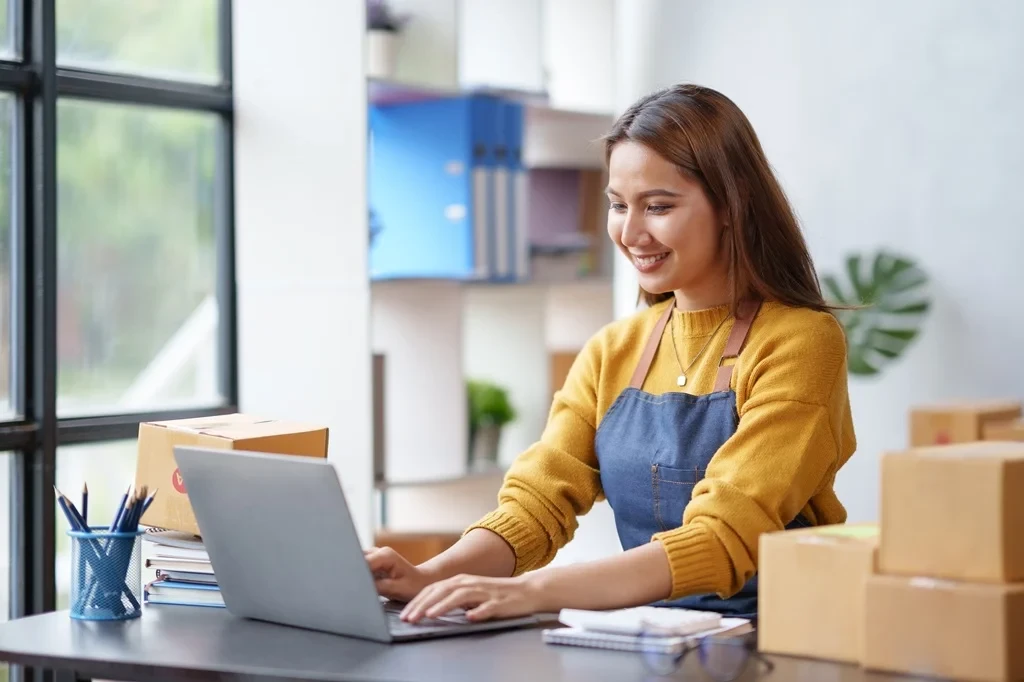 Woman Researching Sales Associate Resume Tips For Her Job Search