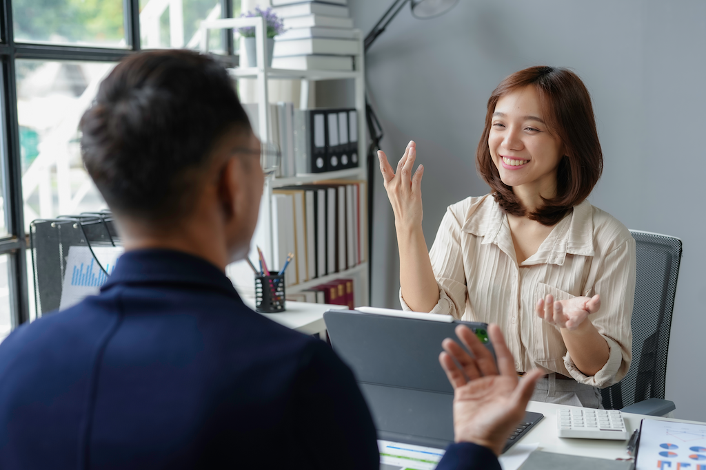 Business People Discussing Interview Etiquette