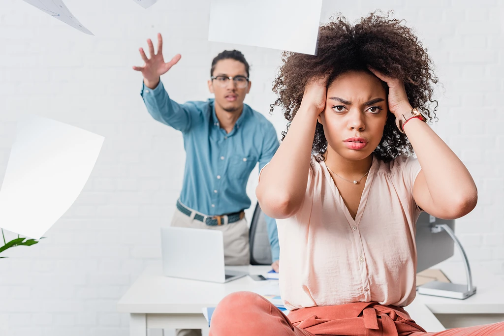 Businesswoman Suffering From Headache