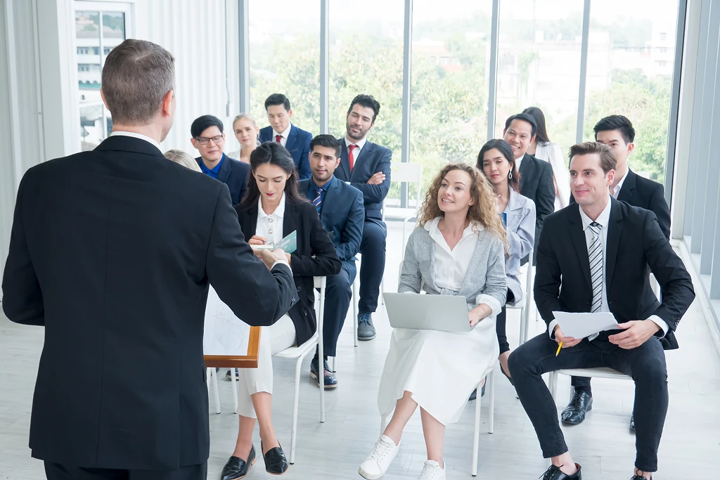 Diverse People Attending A Seminar Presentation