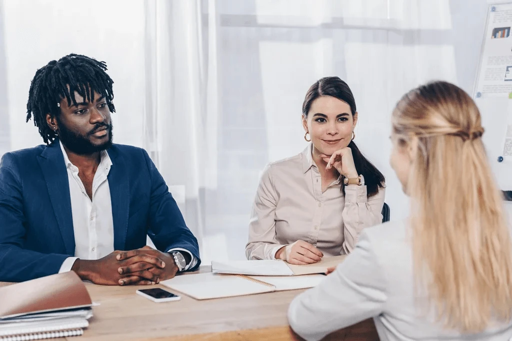 Hiring Managers Carefully Listening To The Answers Of The Applicants