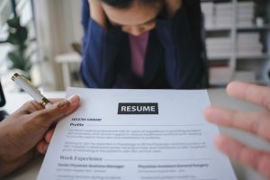 Job Applicant Analyzing Her Resume Mistakes