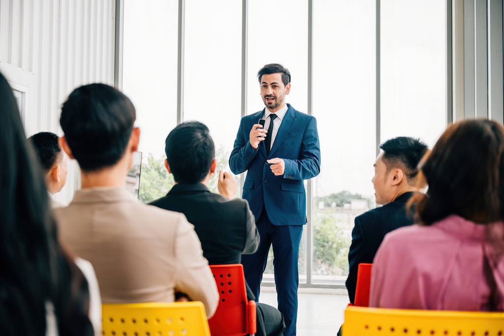 In A Meeting Room Business Professionals Public Speaking Skills