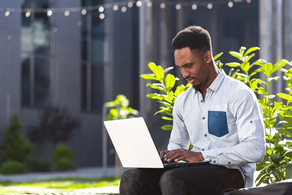 Job Applicant Researching How To List His Education On A Resume