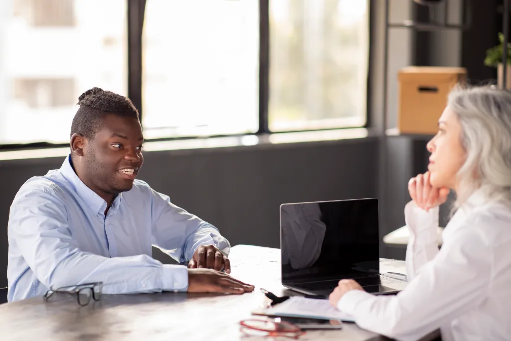 Black-Man-Having-Job-Interview-Talking-To-Hr-Manager-Indoor