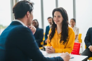 Male-Hr-Hiring-A-Smiling-Female-At-Job-Interview