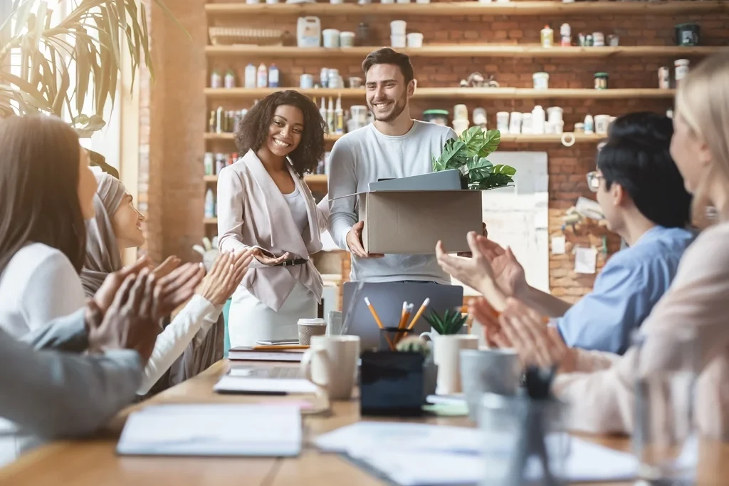 New Employee Being Welcomed At A Healthy Work Environment