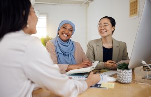 Teamwork, Diversity And Business Women In A Meeting For Planning Or Strategy In Their Professional